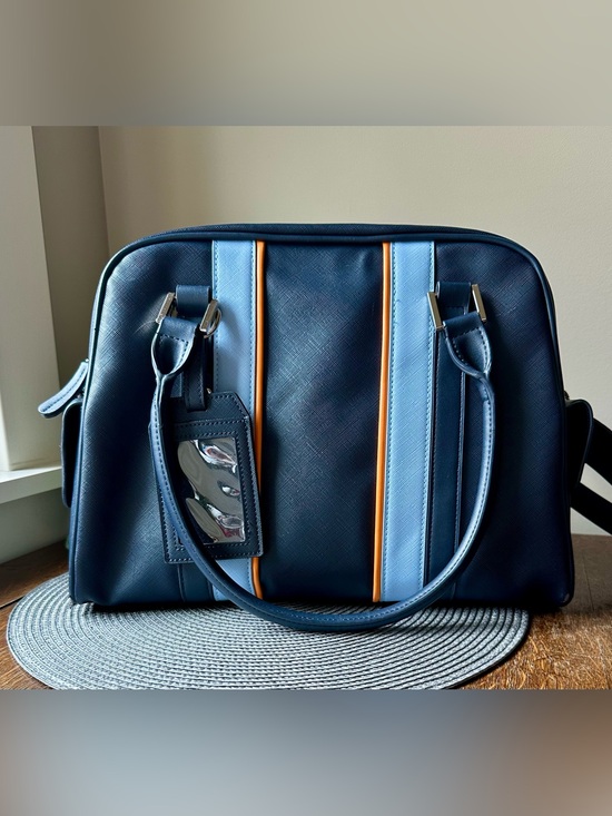 Unisync Handbags - Porter Airlines Unisync Travel Retro Striped Bowling-Style Flight Bag with Pouch